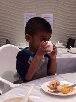 Having a taste of his first chrysanthemum tea