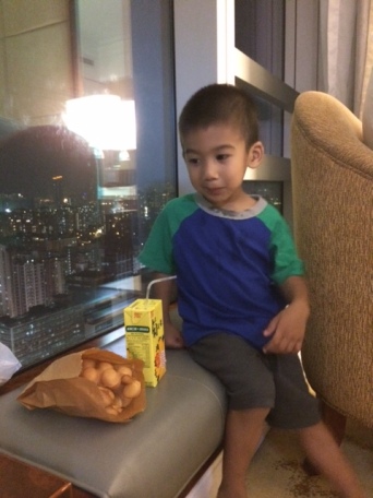 Awesome street snacks enjoyed in the comforts of our room with the fantastic city view