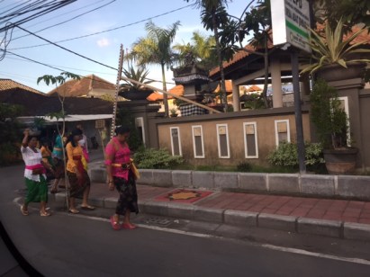 Locals all dressed up on Nyepi Eve while we were in search for any food place that was opened..