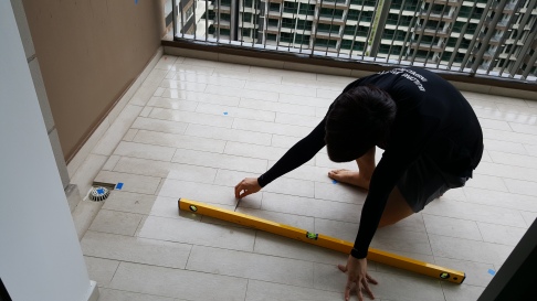 Checking floor level and uneveness in wet areas.jpeg